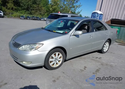 2004 Toyota Camry Xle z USA, uszkodzony, nr VIN 4T1BE30K54U928149